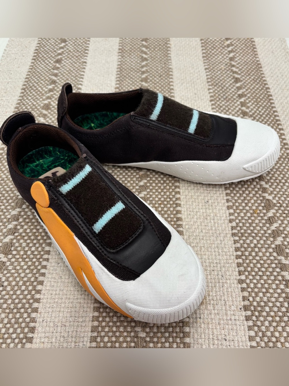 CUSHE Brown Slip-On Sneakers with White Toe and Orange Heel Accent